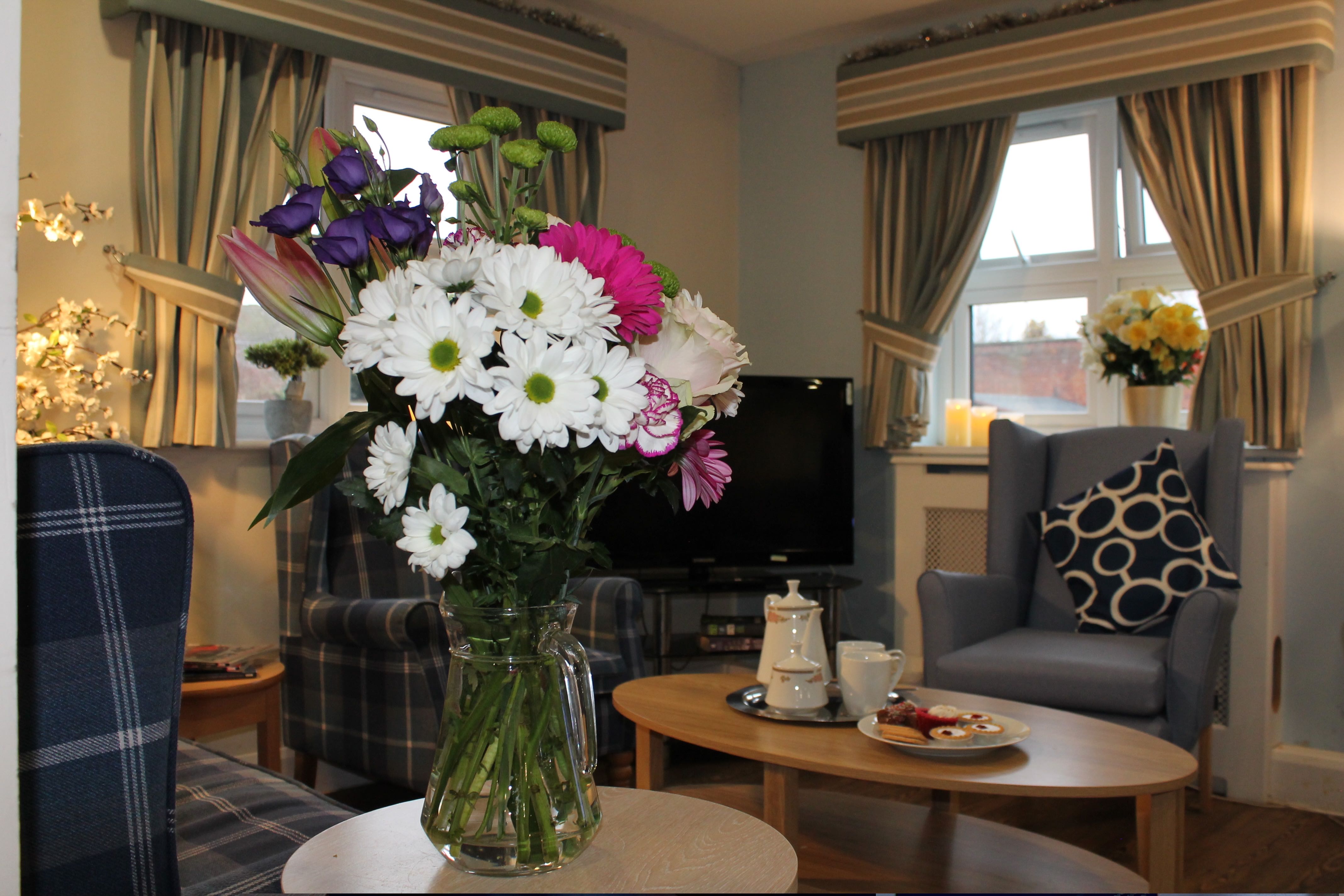 Warm reception area with soft seating